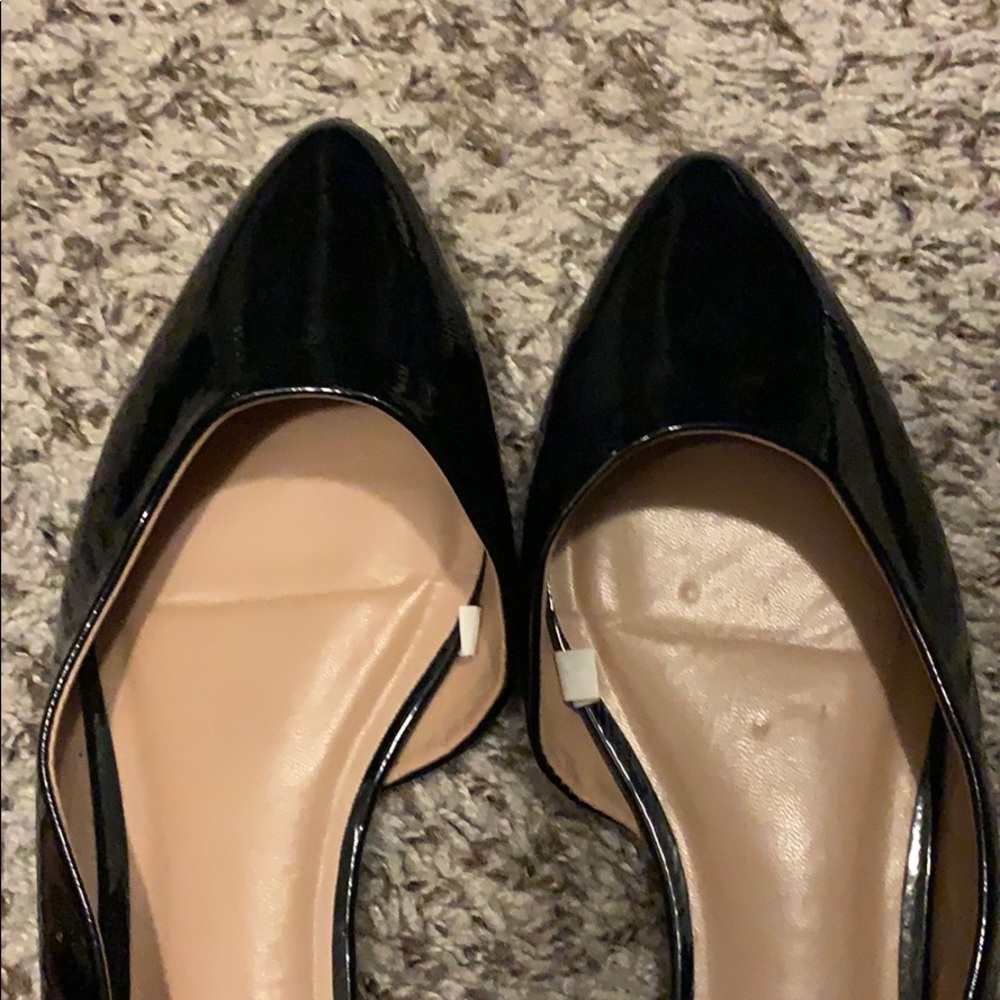 Black pointed flats